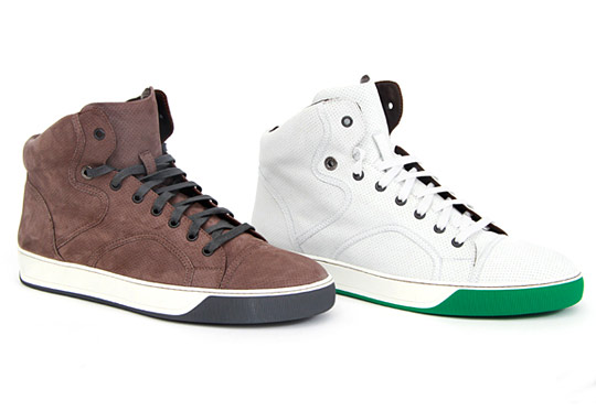 Black canvas high top sneakers or tennis shoes on a white background